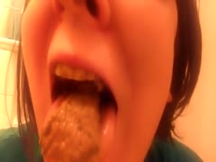 Lady eating poop like it is a candy